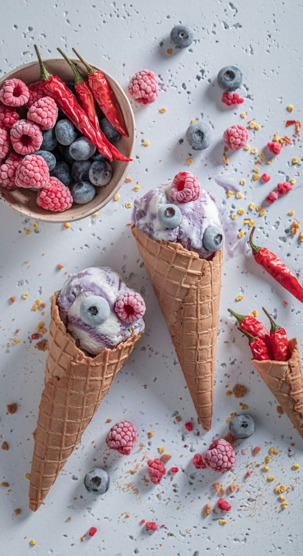Sweet ice cream with chilli and fruits. Unique icecream.